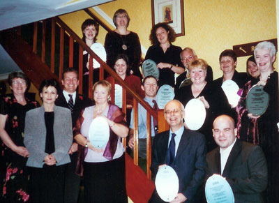 photo : (41KB) : Shown are those who received marketing awards at the PPRG Conference, along with Linda Smith (far left) PPRG Chair, Susan Peat, from Farries (second left) and Margaret Haines, President of CILIP (centre, rear). Roddy MacLeod (front, 2nd from right), EEVL Manager, received an engraved plaque on behalf of all of the team at EEVL which had worked on the OneStep campaign from November 2003 to July 2004.