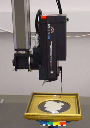 photo (22KB) : Figure 4 : An object from UCL Art Collections (Portrait of Mrs Flaxman) under the Arius3D scanner. Photograph: Mona Hess