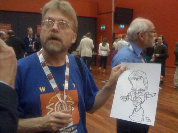 photo (47KB) : Figure 1 : Brian Kelly (left) with his caricature