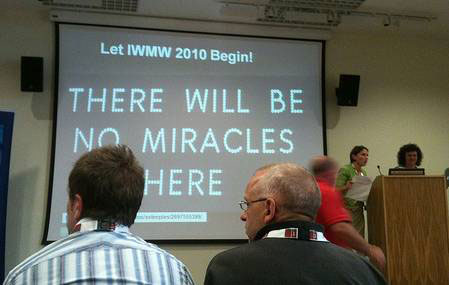 photo (24KB) : Health warning at opening of IWMW10 Workshop