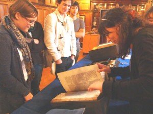 Figure 2: Dr Guyda Armstrong shows her students a selection of early printed editions of Dante. © Mimas, University of Manchester